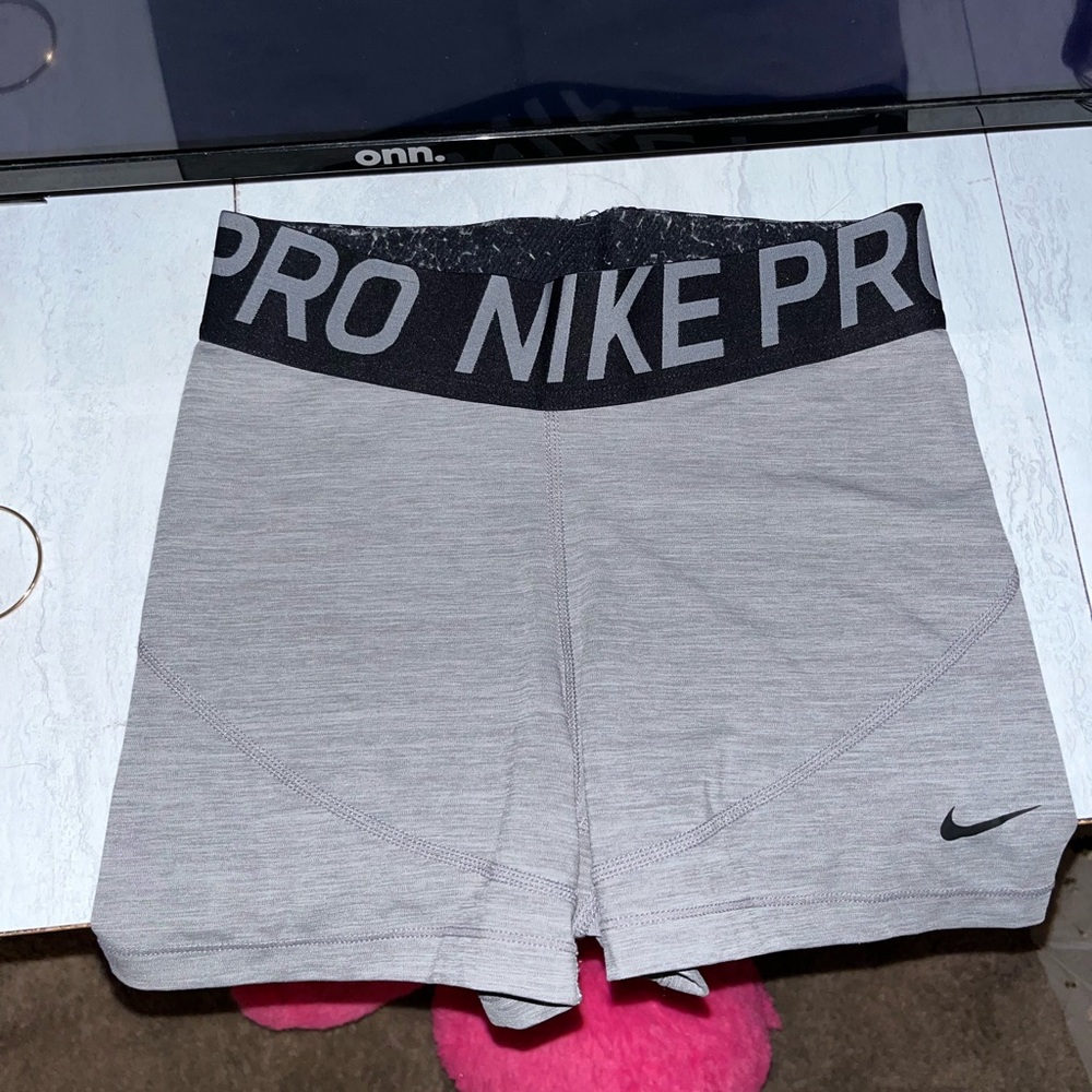 Grey NIKE Pros, (dry-fit)